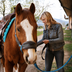 Female equestrian instructor with horse
